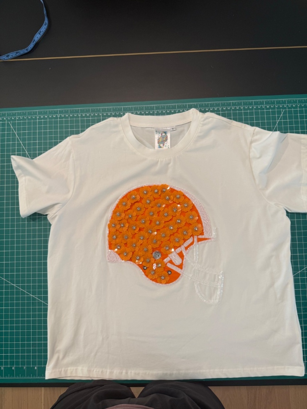 Queen of Sparkles: Orange and White Flower Helmet Tee - Picture 2 of 2